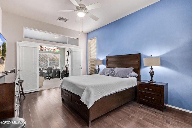 bedroom featuring ceiling fan and dark hardwood / wood-style flooring