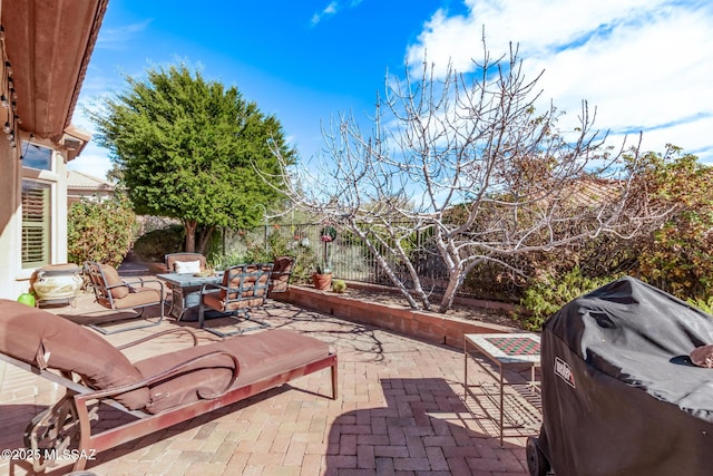 view of patio with a grill