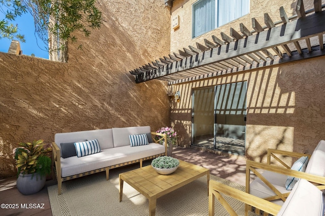 view of patio / terrace featuring an outdoor hangout area and a pergola