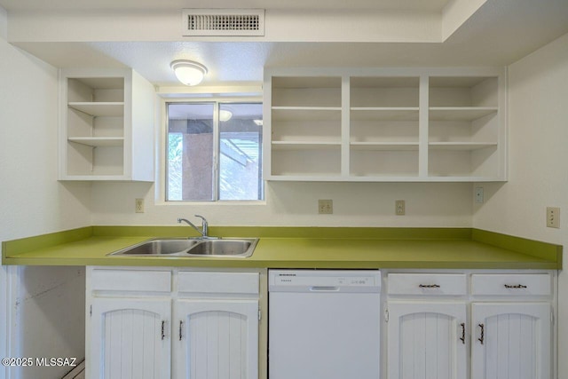 kitchen with white cabinetry, dishwasher, and sink