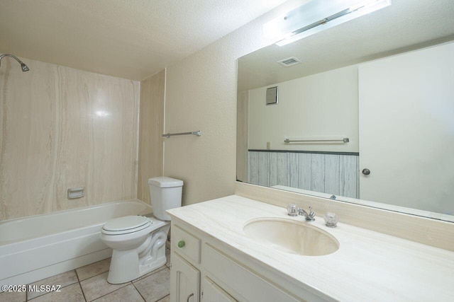 full bathroom with vanity, a textured ceiling, bathtub / shower combination, tile patterned floors, and toilet