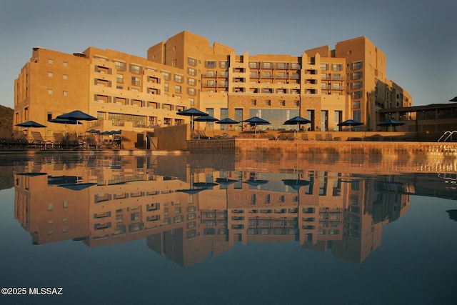 view of building exterior with a water view