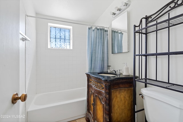 full bathroom with toilet, vanity, and shower / bath combo with shower curtain