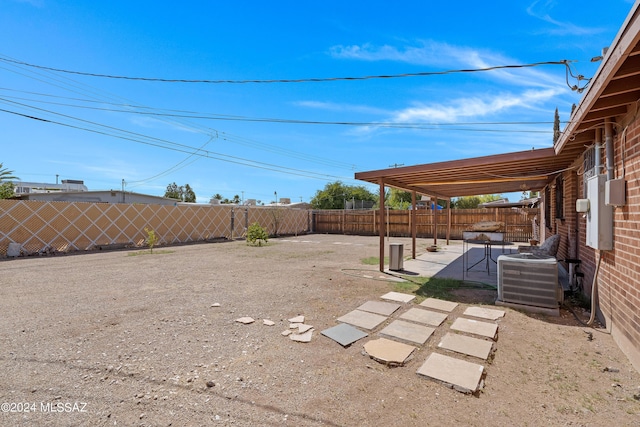 view of yard with a patio area and cooling unit