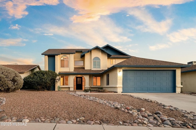 view of front of house with a garage