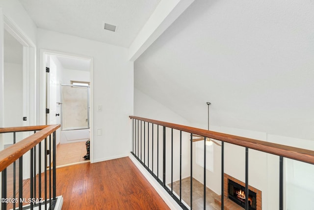 hallway featuring hardwood / wood-style flooring