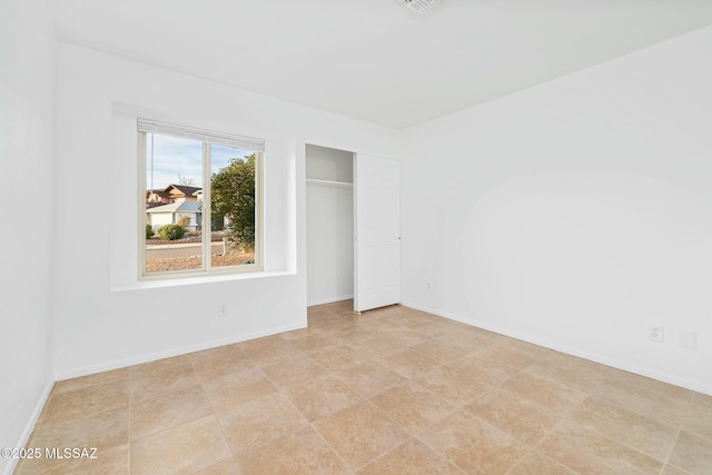 unfurnished bedroom featuring a closet