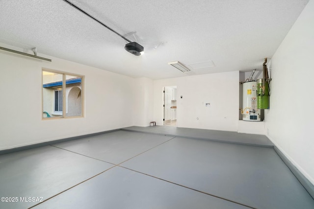 garage with water heater and a garage door opener