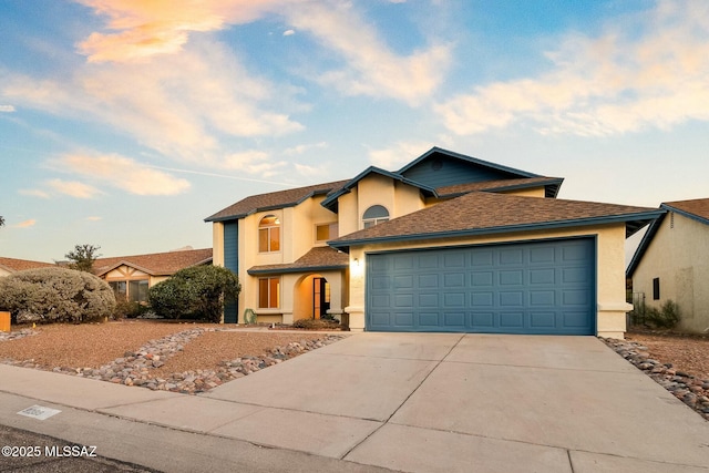 view of front of home featuring a garage