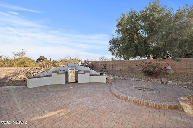 view of patio with area for grilling