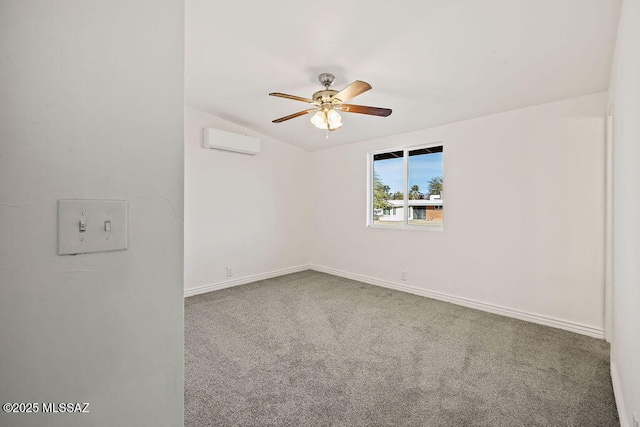 carpeted spare room featuring a wall mounted air conditioner and ceiling fan