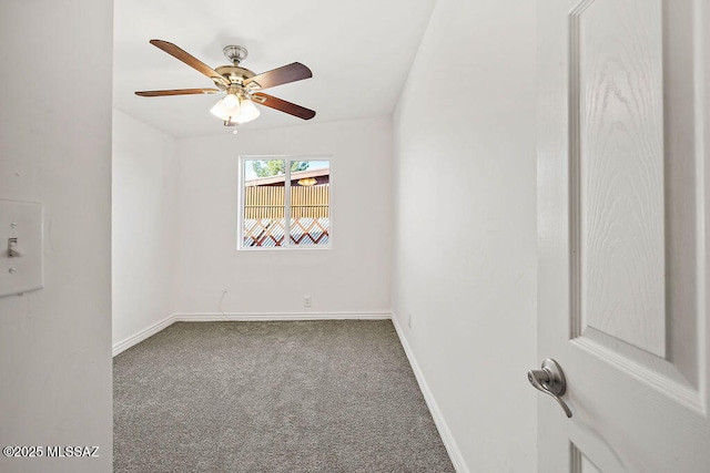 carpeted empty room with ceiling fan