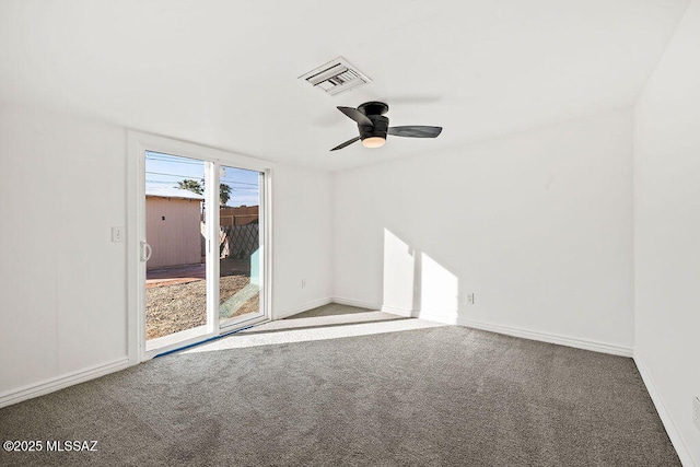 carpeted empty room with ceiling fan