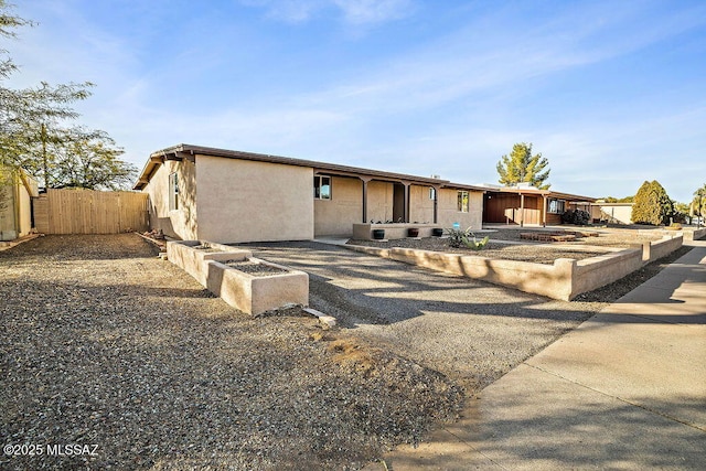 view of front of property with a patio