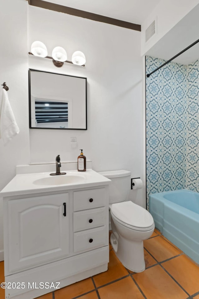 full bathroom with toilet, vanity, tile patterned floors, and shower / bathing tub combination