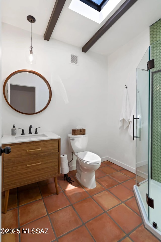 bathroom with a skylight, an enclosed shower, vanity, beamed ceiling, and toilet