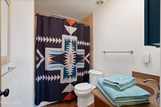 bathroom featuring vanity, tile patterned floors, toilet, and a shower with shower curtain