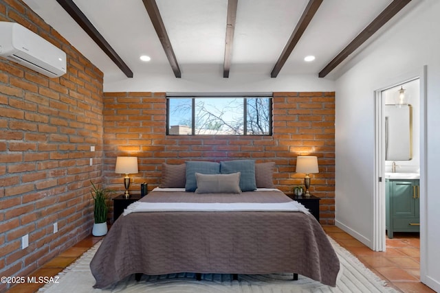 bedroom with beamed ceiling, ensuite bath, brick wall, and an AC wall unit