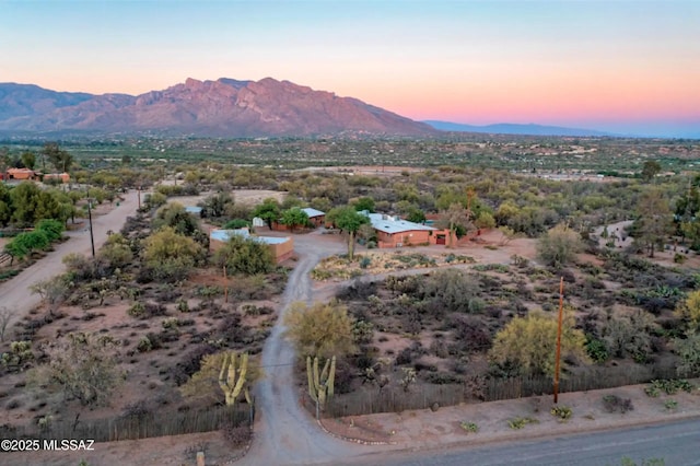 aerial view at dusk with a mountain view