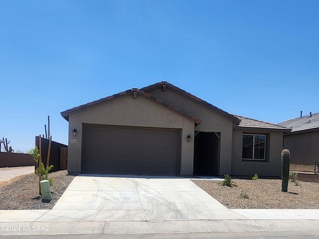 single story home featuring a garage