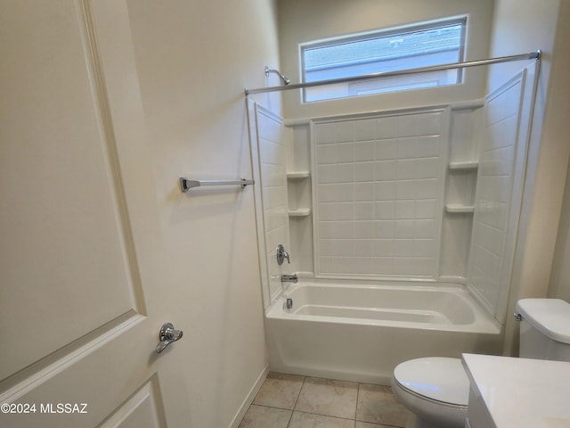 full bathroom featuring toilet, vanity,  shower combination, and tile patterned flooring