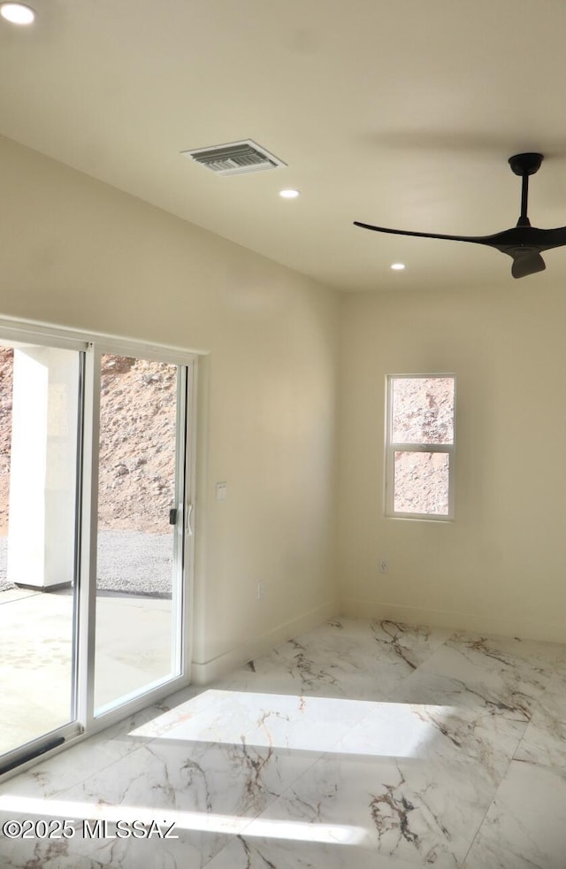 spare room featuring ceiling fan