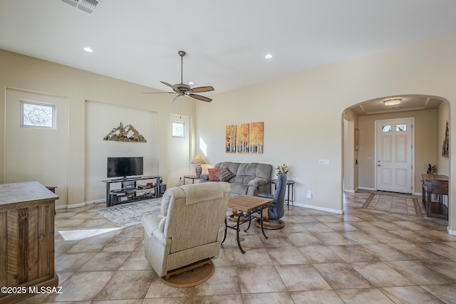 living room featuring ceiling fan