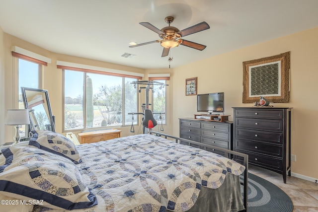 bedroom featuring ceiling fan