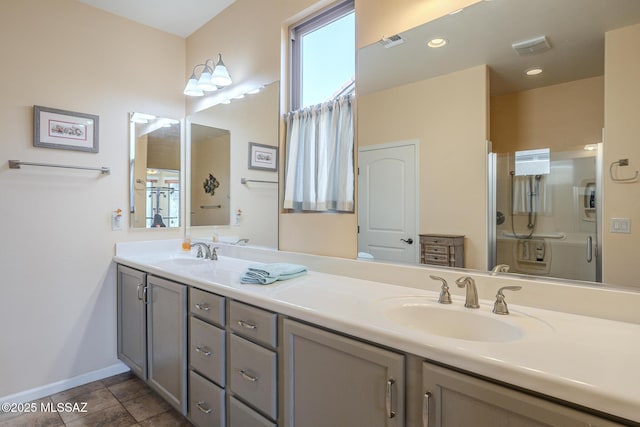 bathroom with vanity and walk in shower