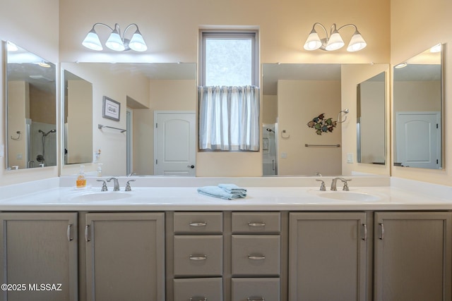 bathroom with an enclosed shower and vanity