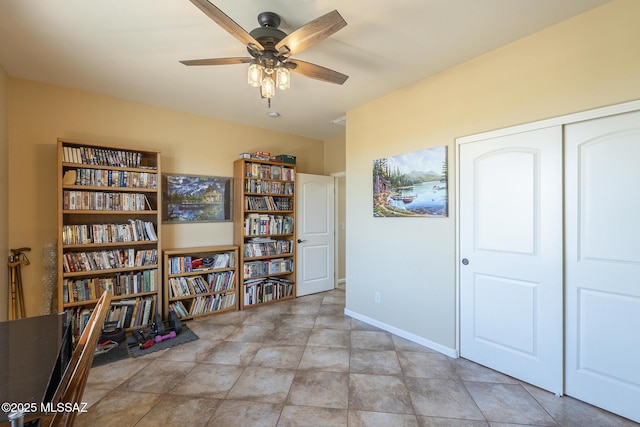 interior space featuring ceiling fan