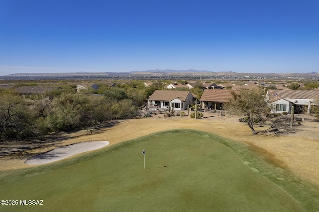 birds eye view of property featuring a mountain view