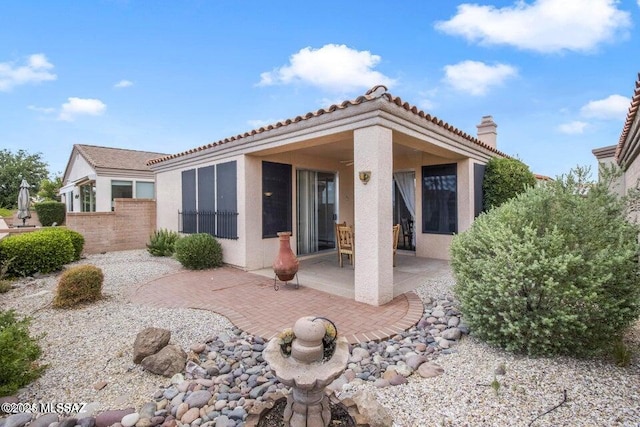 back of house featuring a patio