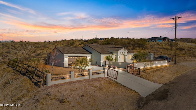 view of front of property with a garage