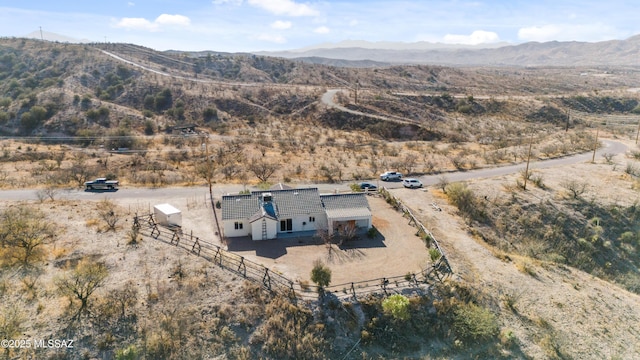 rear view of property featuring a mountain view