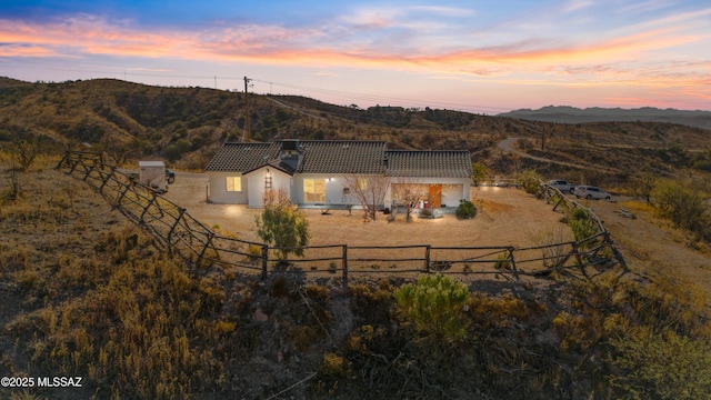 exterior space featuring a mountain view