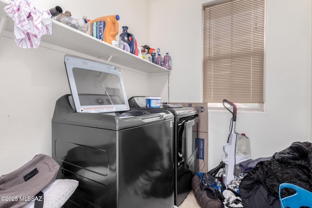 washroom with separate washer and dryer