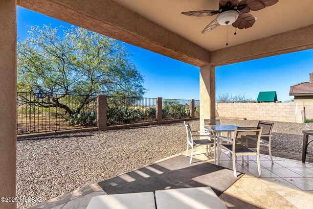 view of patio with ceiling fan