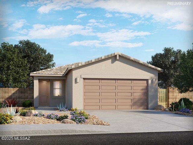 view of front of property with a garage