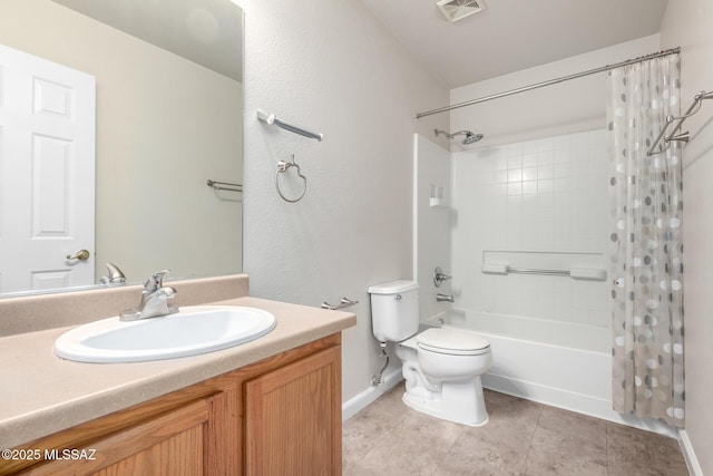 full bathroom with shower / tub combo with curtain, vanity, tile patterned floors, and toilet