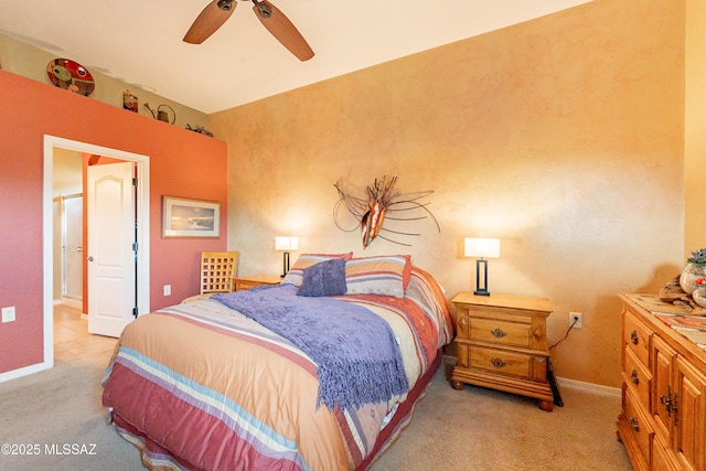 bedroom with ceiling fan and light colored carpet