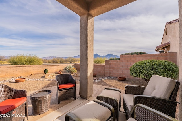 view of patio with a mountain view