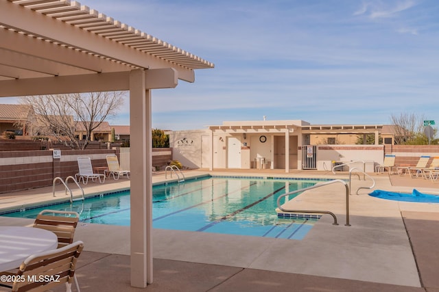 view of pool featuring a pergola and a patio