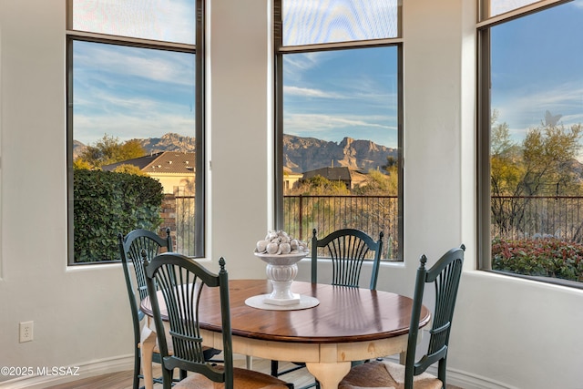 dining room with a mountain view