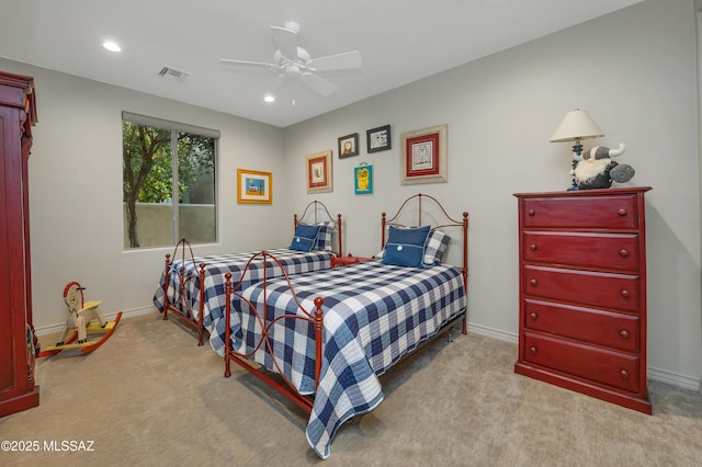 carpeted bedroom with ceiling fan