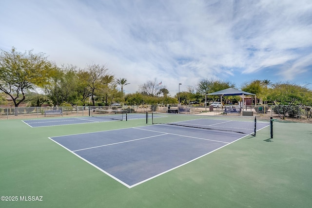 view of tennis court featuring a gazebo