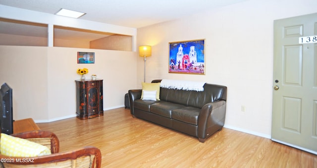 living room with hardwood / wood-style flooring