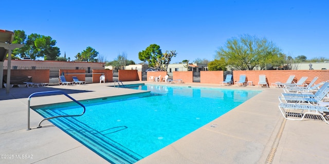 view of pool featuring a patio