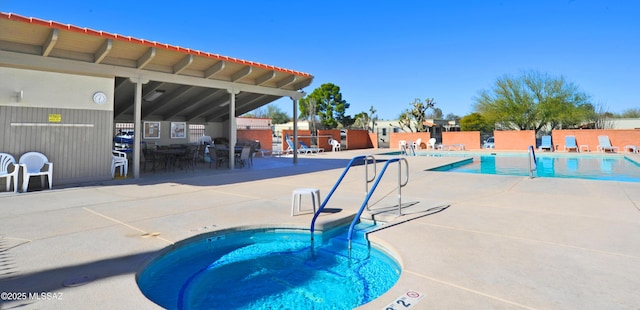 view of pool featuring a patio