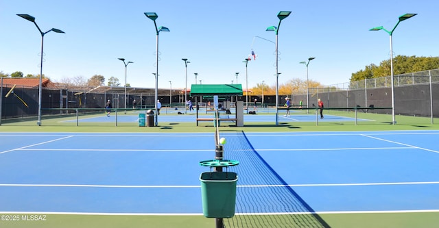 view of sport court featuring basketball hoop